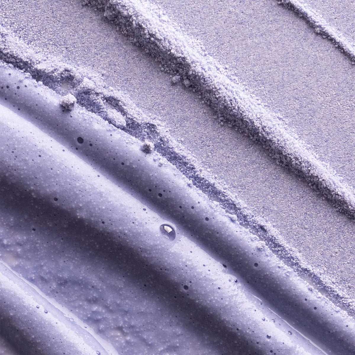 TATCHA creamy white foam texture of rice polish highlighting gentle polishing benefit