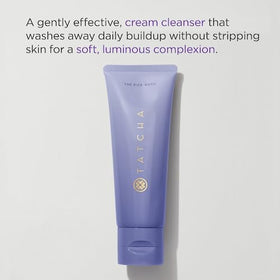 TATCHA pouring cleanser into hand to demonstrate easy application and mild lather