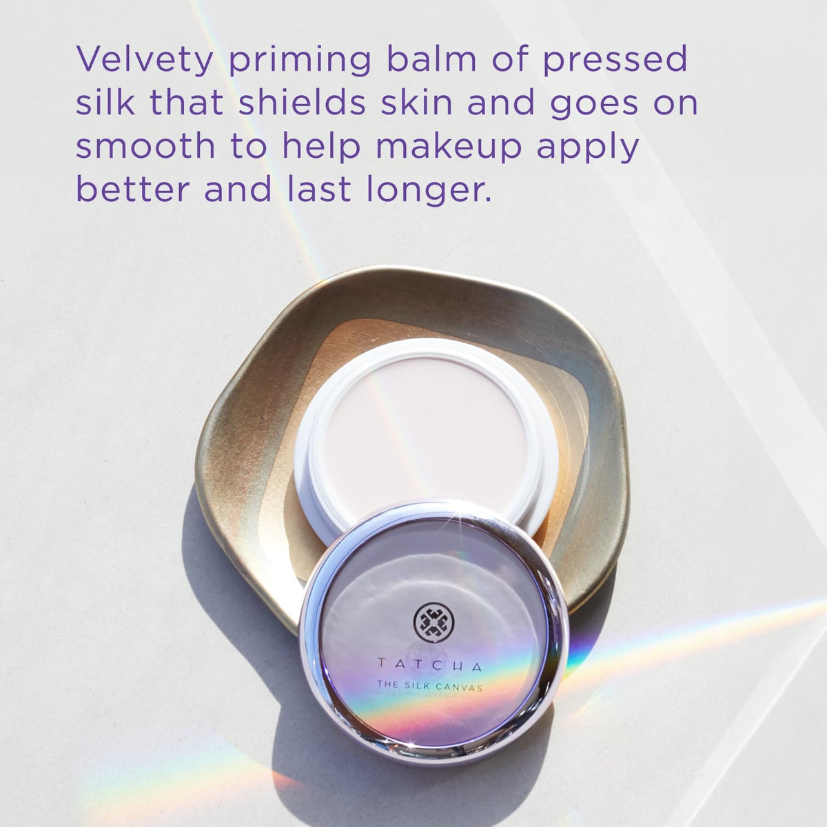 Tatcha fingers applying balm demonstrating easy melting and smooth application benefit
