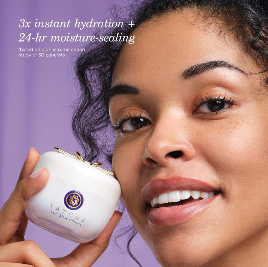 TATCHA cream on fingers demonstrating silky texture and easy absorption
