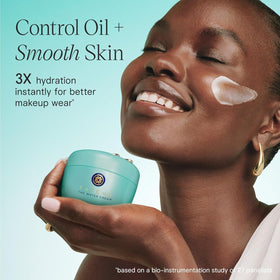 TATCHA cream droplets on skin demonstrating fast-absorbing water-burst hydration
