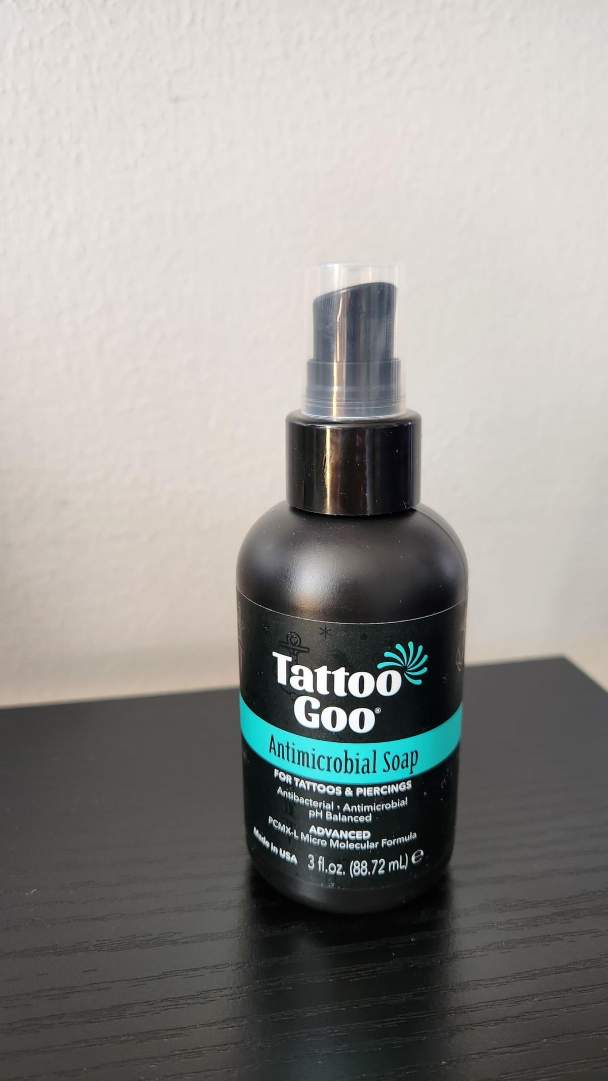 Dermatologist-tested badge with Tattoo Goo emphasizing gentle, tested formula