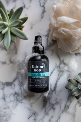 Tattoo Goo foam texture close-up showcasing gentle lather for effective cleaning