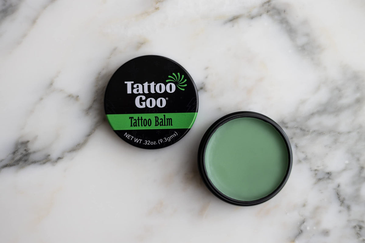 Close-up of Tattoo Goo balm texture highlighting smooth absorbent olive oil formula