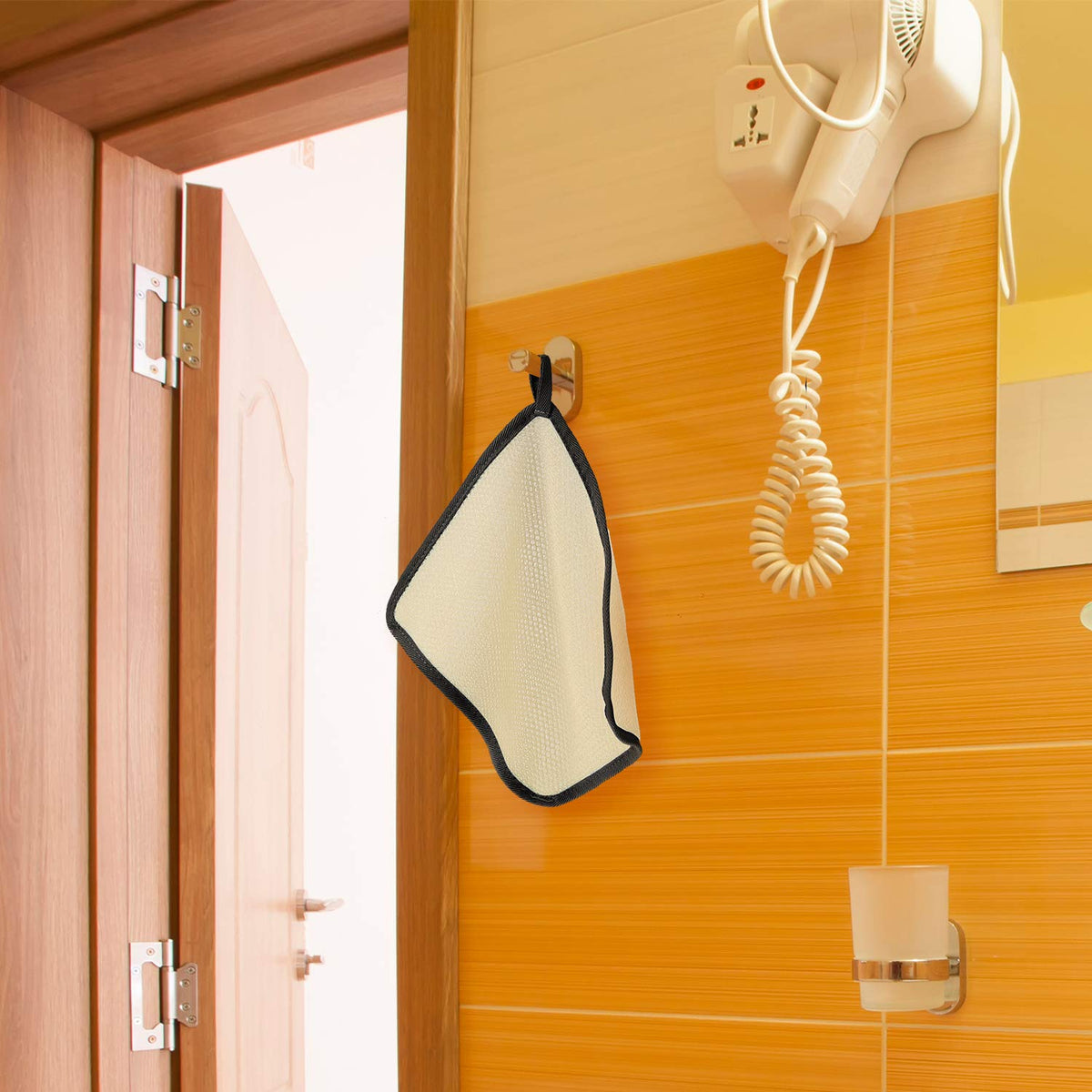 Tatuo towel in shower use demonstrating quick lathering and cleansing benefit