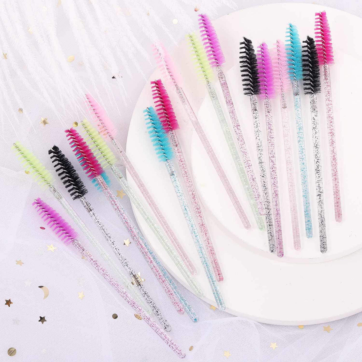 Tbestmax in-use image combing lashes with a spoolie for cleaner, clump-free results
