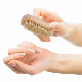 Tbestmax brush held in hand to show size, compact portable design