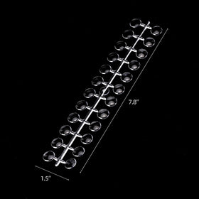 Tbestmax dot next to a ruler for scale to visualize size and plan storage efficiently