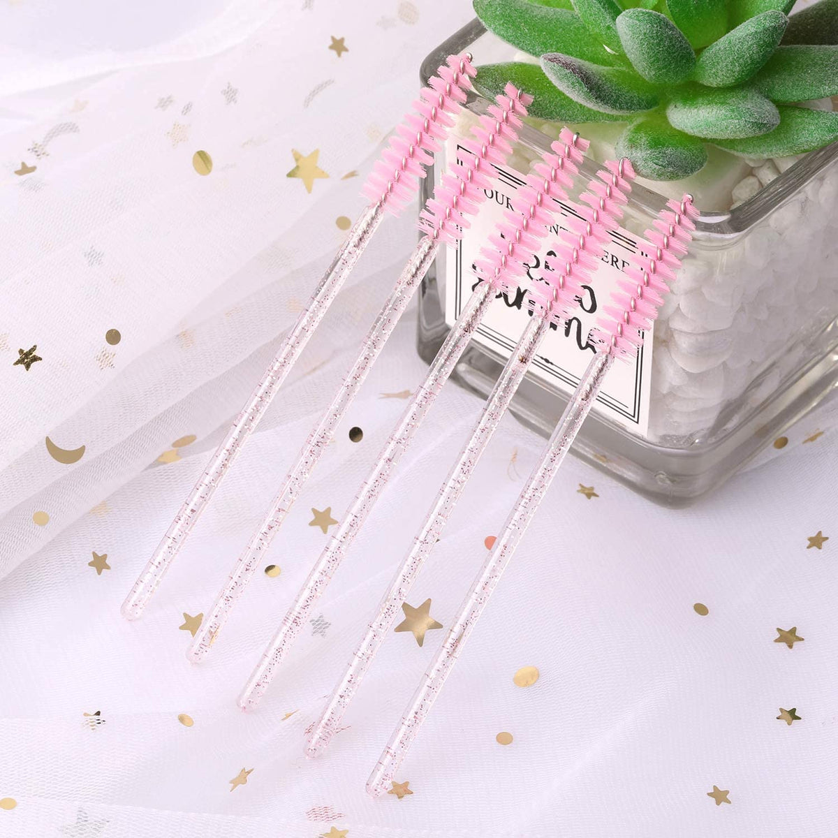 Tbestmax using spoolie on lashes to separate and remove clumps