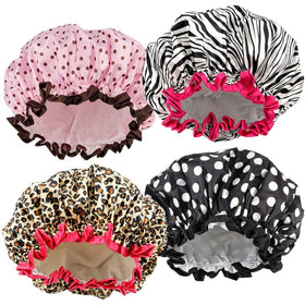 TCOTBE front view of four shower caps showing patterns and coverage benefit