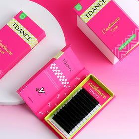 TDANCE lashes beside ruler indicating precise length and scale accuracy