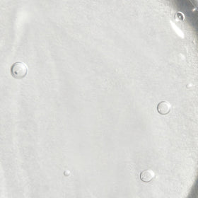Tea Tree gel being applied to hair demonstrating firm hold benefit