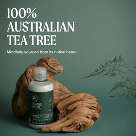 Tea Tree conditioner staged in bathroom for invigorating refresh benefit