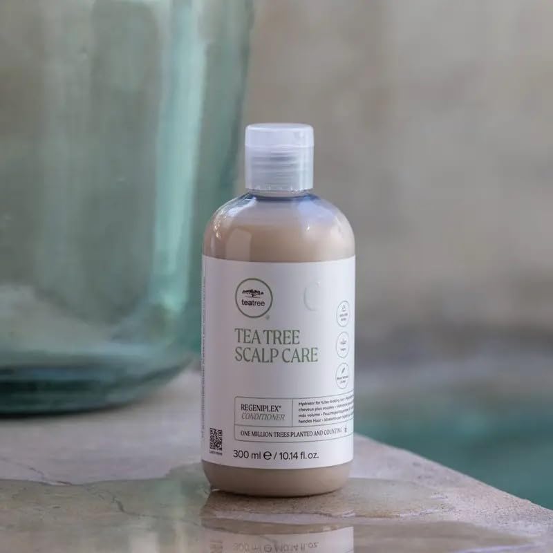 Tea Tree in-shower application on wet hair showing easier combing and reduced breakage