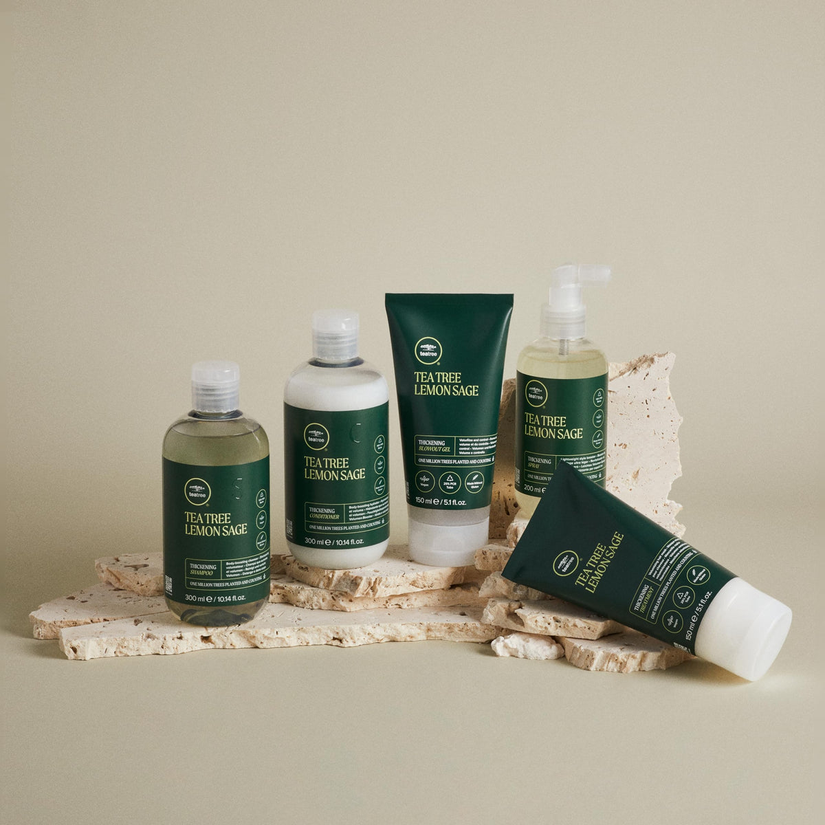 Tea Tree bottle on bathroom counter suggesting daily styling use and fresh scent