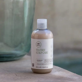Tea Tree Regeniplex lather close-up showing creamy foam and gentle cleansing action