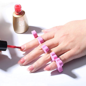 Tecbeauty hand holding a separator for size comparison and portability