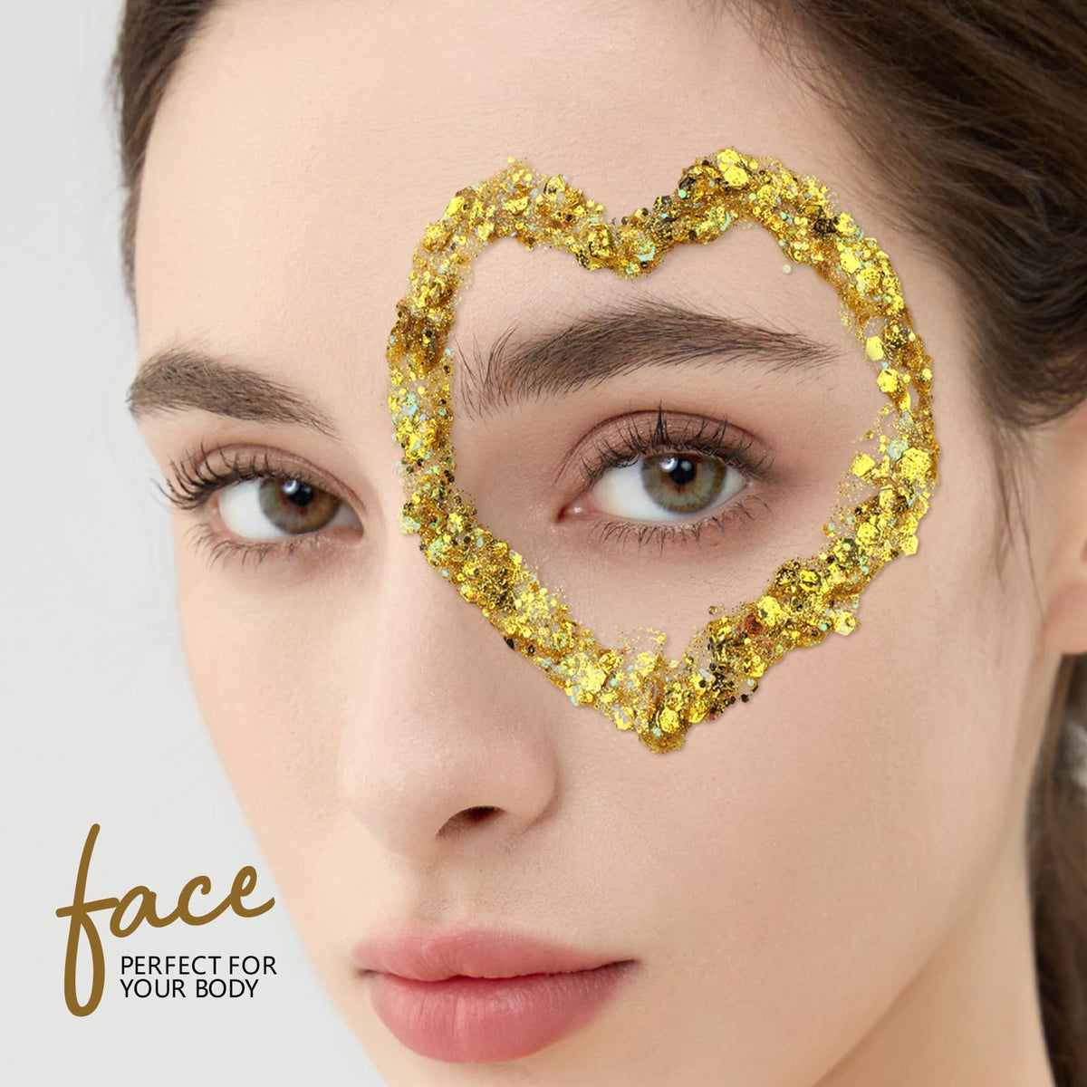 Teenitor gold glitter applied to a child's cheek adds festive shine