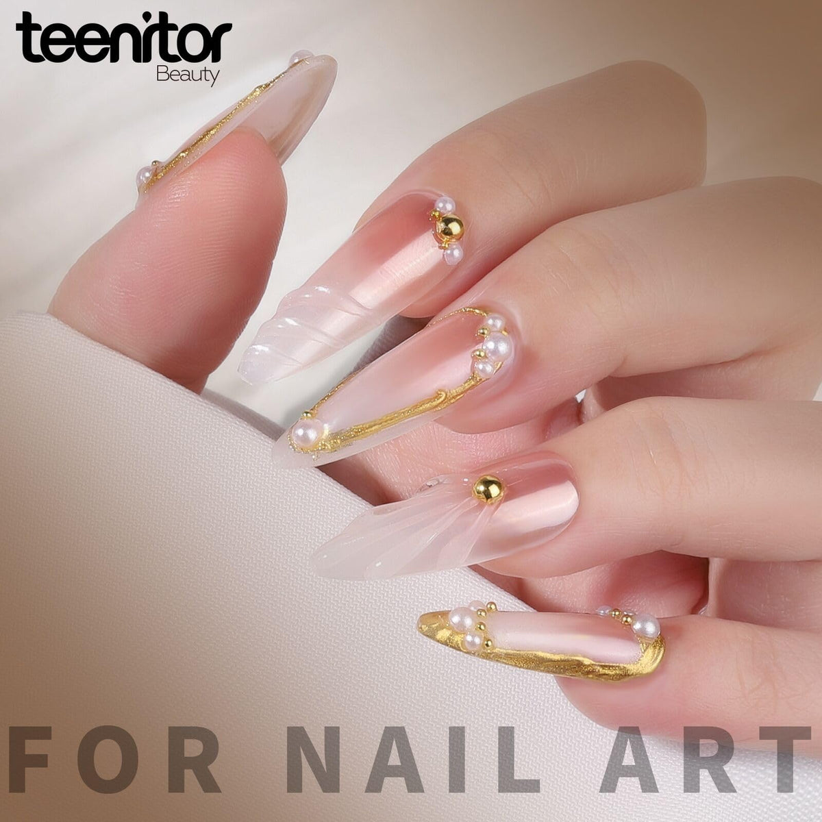 Teenitor finished manicure lifestyle shot showing mirror chrome nails and decorated accents