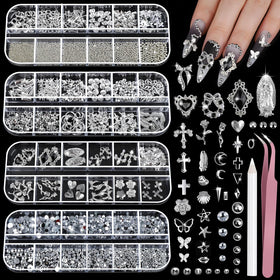 Teenitor front packaging showing four-box silver nail charms kit and tools for versatile designs