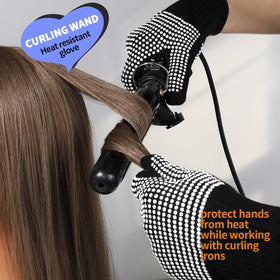 Teenitor glove worn while holding a curling iron for safe styling