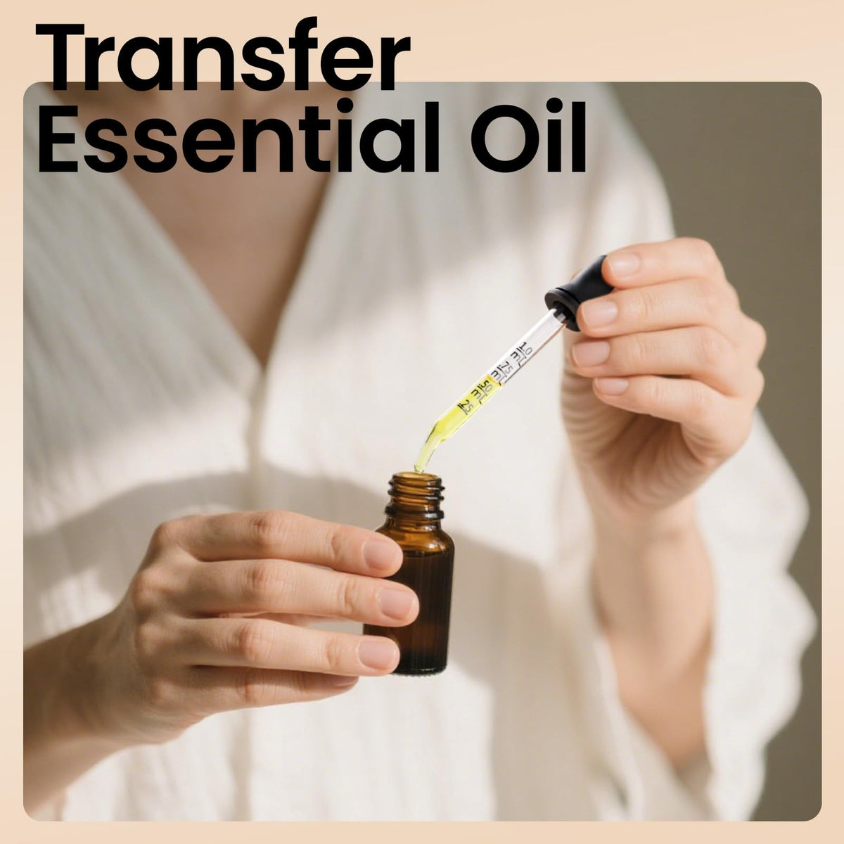 Teenitor glass dropper dispensing essential oil demonstrating controlled single-drop application