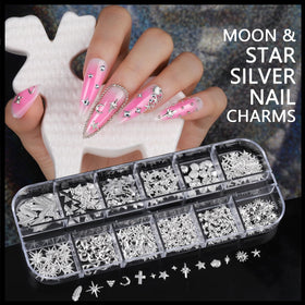 Teenitor nail application in-progress showing charm placement and layered 3D effect