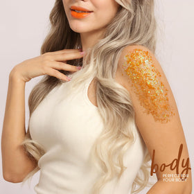 Teenitor glitter gel on festival-goer at rave showing long-lasting party-ready shimmer
