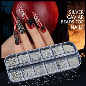 Teenitor adhesive sticker sheets fanned out showing diverse silver motifs for bases