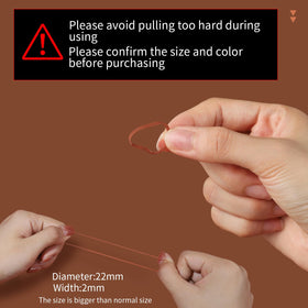 Teenitor elastic stretched between fingers showing strong stretch and snap resilience