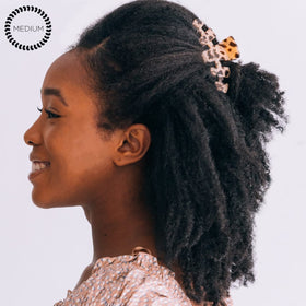 Teleties curved profile side view offering comfortable scalp contouring