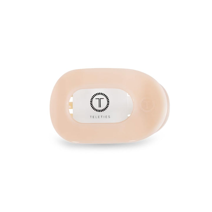 TELETIES flat round clip front view showing compact almond beige design and comfortable hold