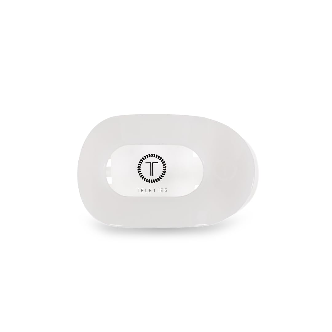 TELETIES front view of flat round clip showing clean coconut white finish and compact silhouette for comfort