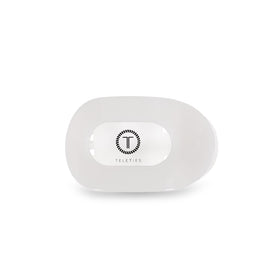 TELETIES front view of flat round clip showing clean coconut white finish and compact silhouette for comfort