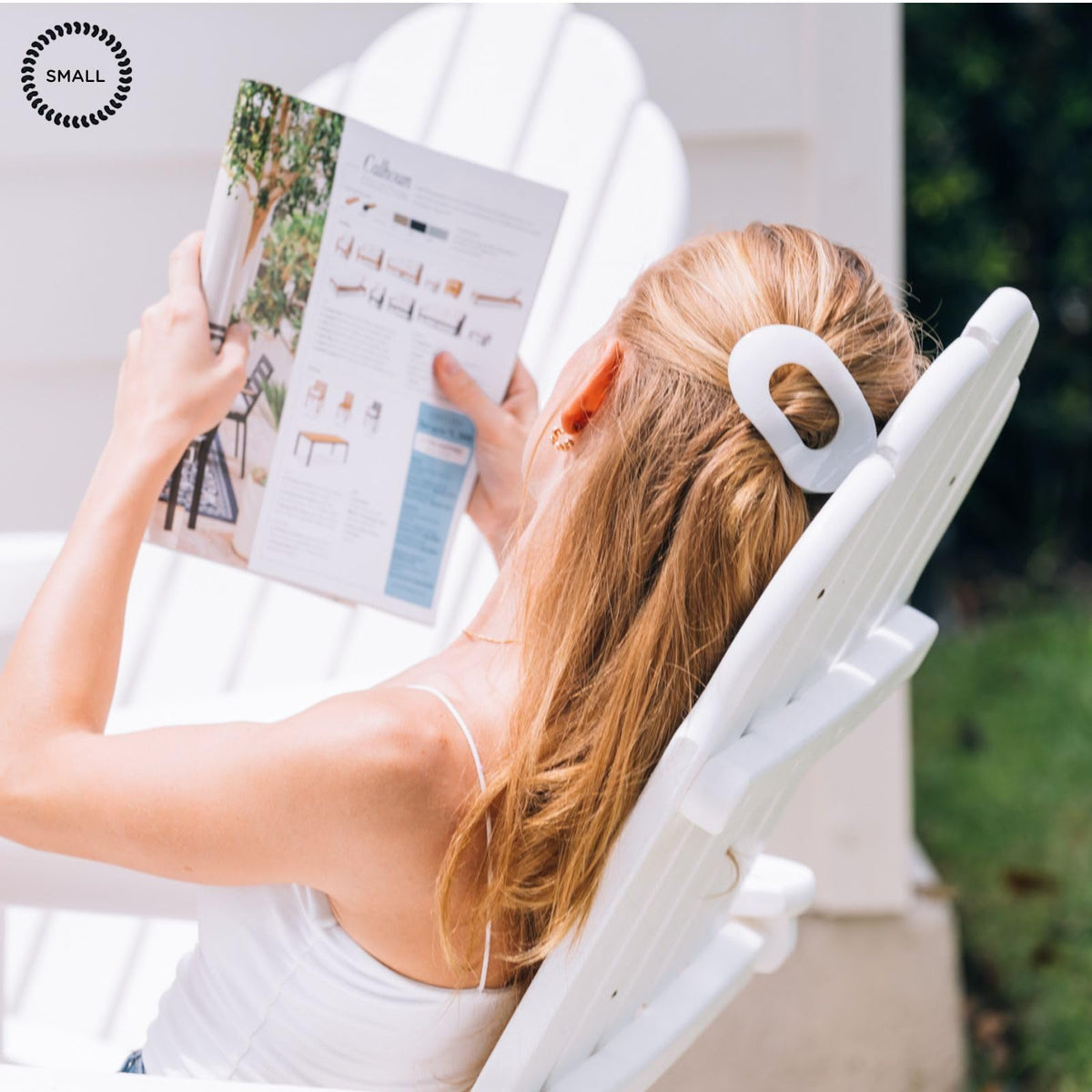 TELETIES clip securing a small bun, offering a discreet no-slip hold for everyday styling