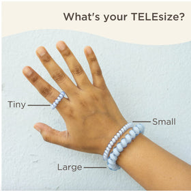 teleties large tortoise on wet hair showing water resistance and no sagging