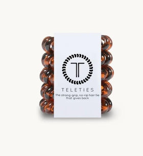 TELETIES tortoise close-up of smooth spiral texture highlighting snag-free surface and gentle removal