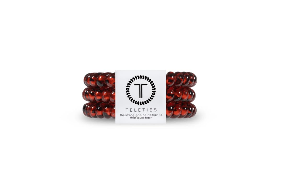 TELETIES tortoise front pack showing three small spiral hair coils and compact packaging benefit ease of storage