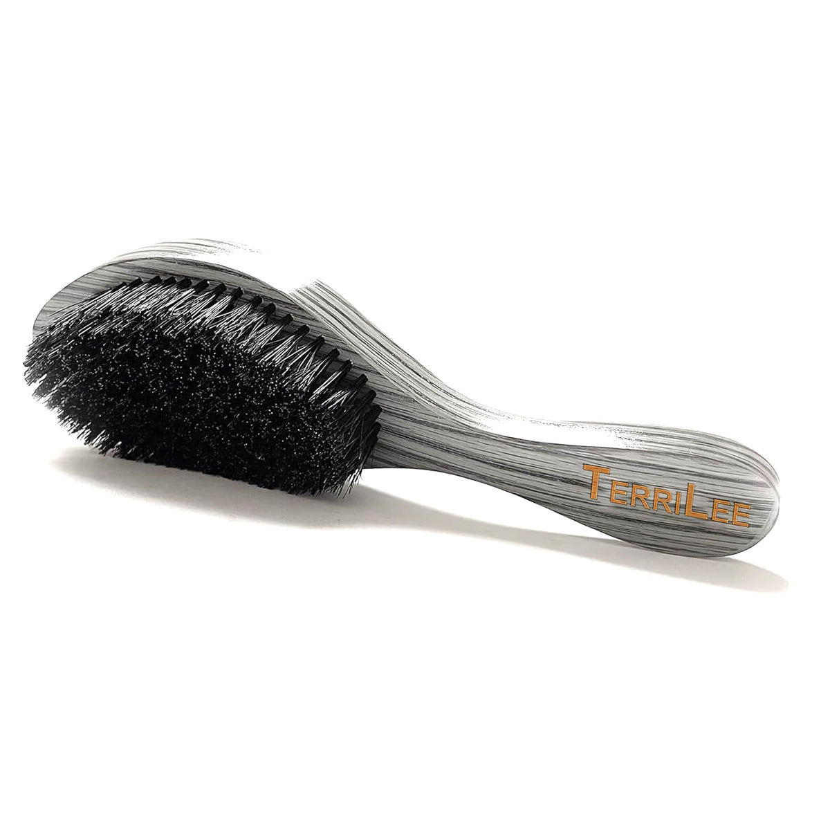 Terrilee with comb beside it highlighting trimming and pocket-friendly convenience for touch-ups