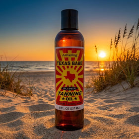Applying Texas Babe oil in hand demonstrating smooth application and hydration benefit