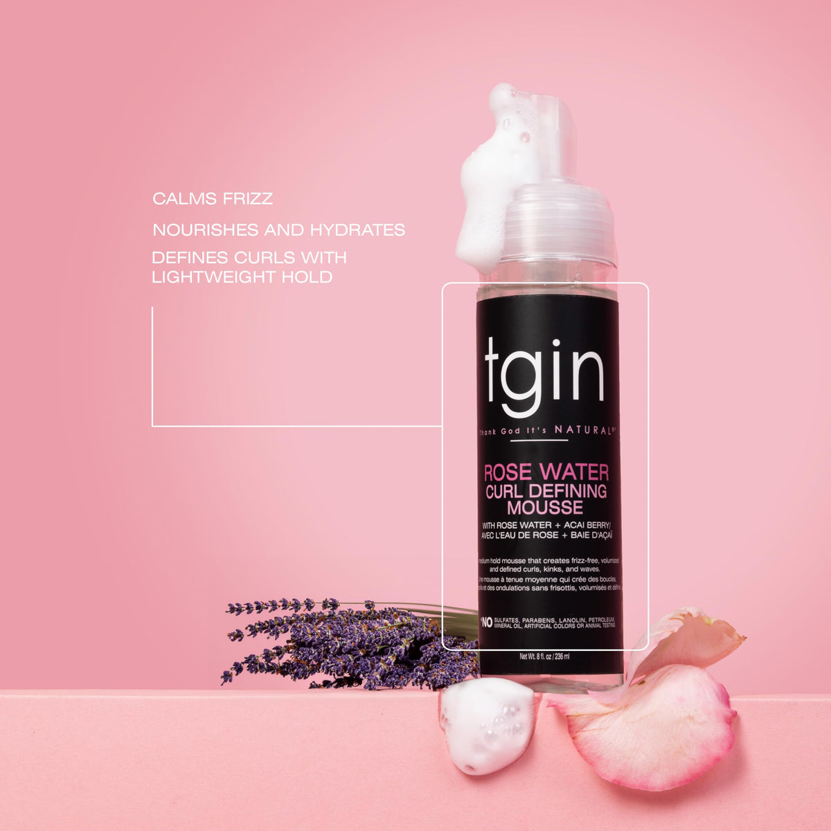 tgin application on damp curls illustrating easy distribution and definition
