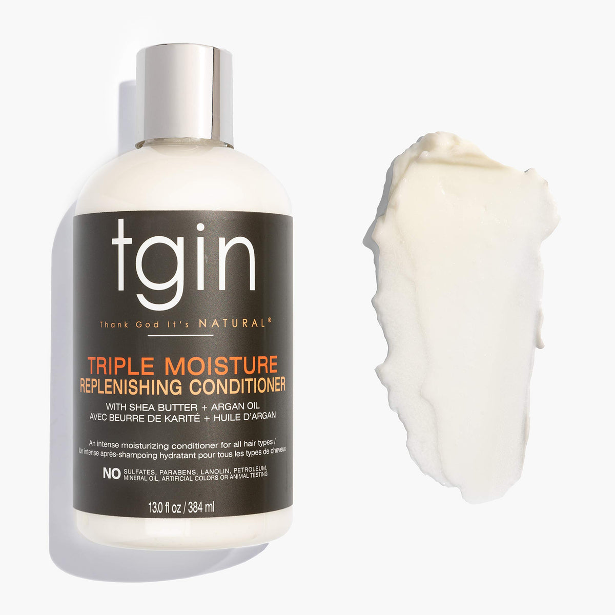 Thank God It's Natural conditioner creamy texture demonstrating rich moisture