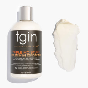 Thank God It's Natural conditioner creamy texture demonstrating rich moisture