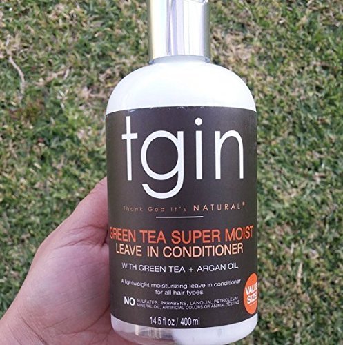 tgin bottle in hand demonstrating 13 oz size and portability