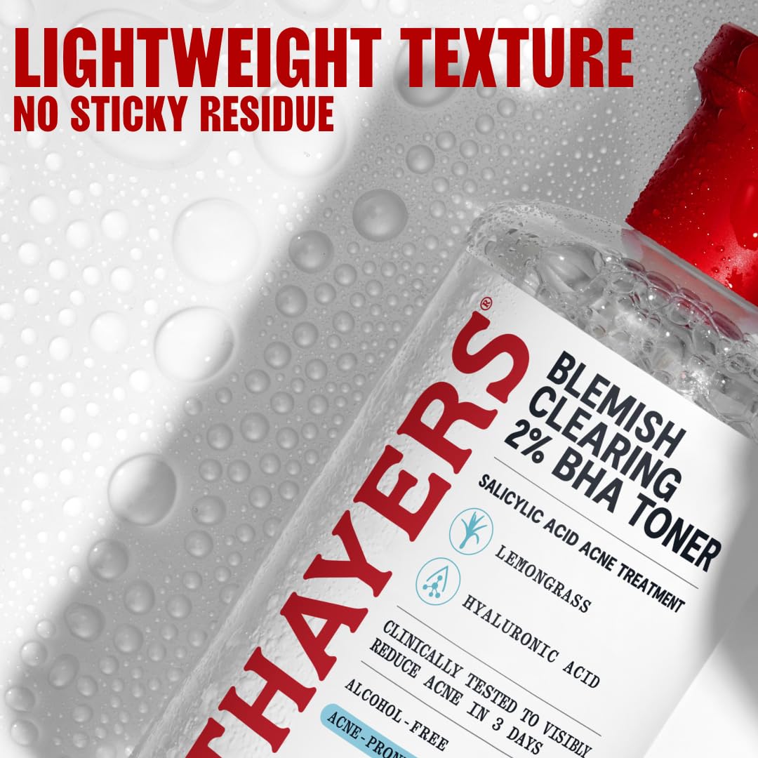 Thayers toner 12 fl oz beside a hand to display true product scale