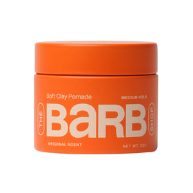 The Barb Shop jar front view showing clean branding and compact size benefit