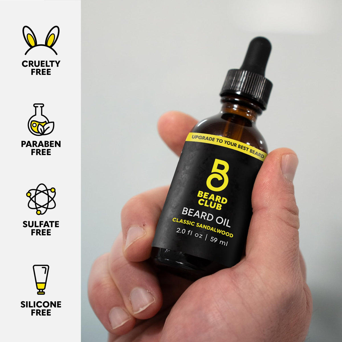 The Beard Club 2oz bottle next to ruler showing compact travel size