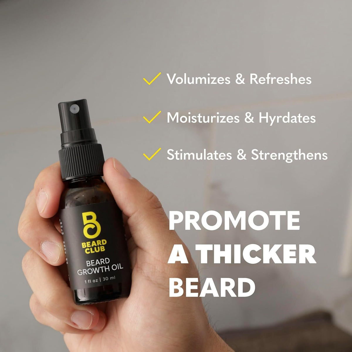 Model applying The Beard Club spray to beard roots indicating targeted nourishment benefit
