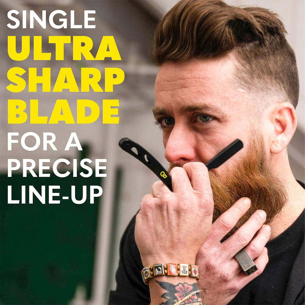 The Beard Club close-up of a stainless steel Derby blade showing sharp edge and reliability