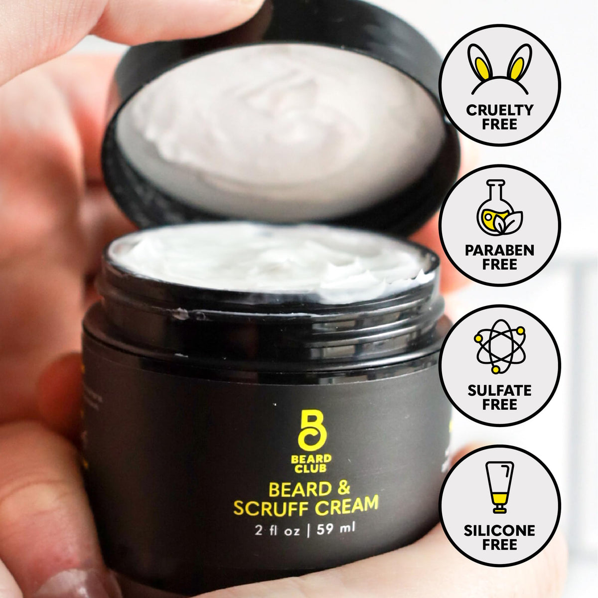 Open jar top view of The Beard Club cream showing creamy consistency benefit: intense hydration